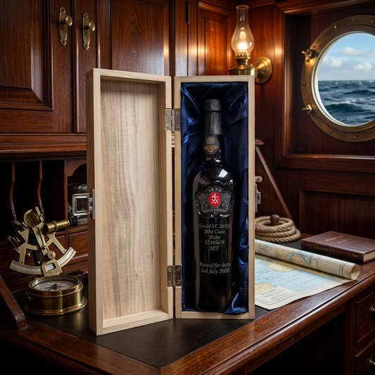 Personalised bottle of port engraved with class, name and passing out date, in an open wooden presentation box